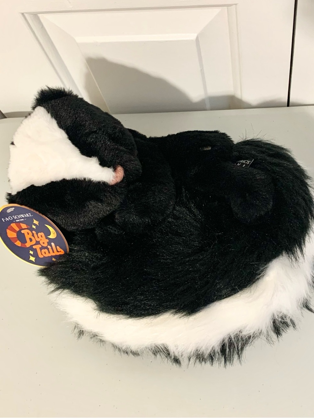 FAO Schwarz Sleeping Skunk Plush Big Tail NWT Plushie Stuffed Animal